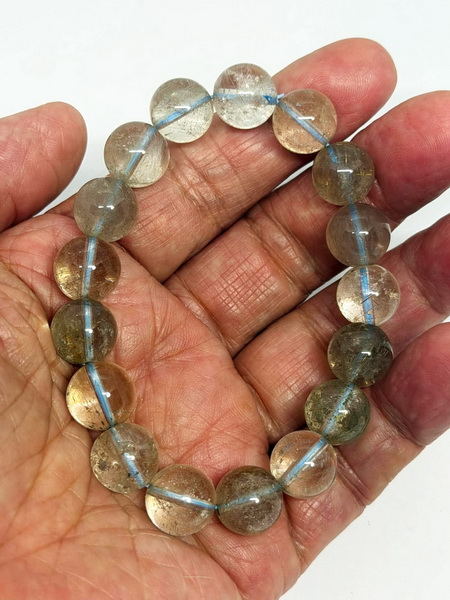 สร้อยข้อมือควอต์ซใส-12 มม. (12 mm. Clear Quartz Bracelace)