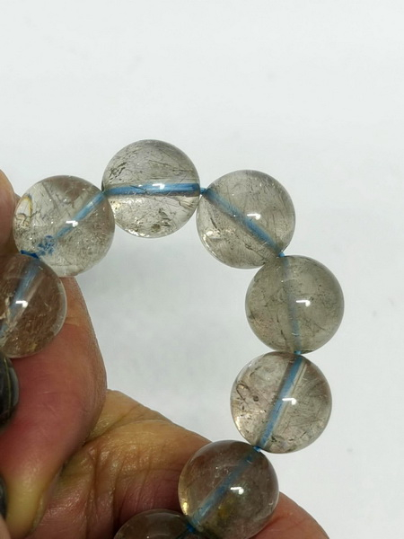 สร้อยข้อมือควอต์ซใส-12 มม. (12 mm. Clear Quartz Bracelace)